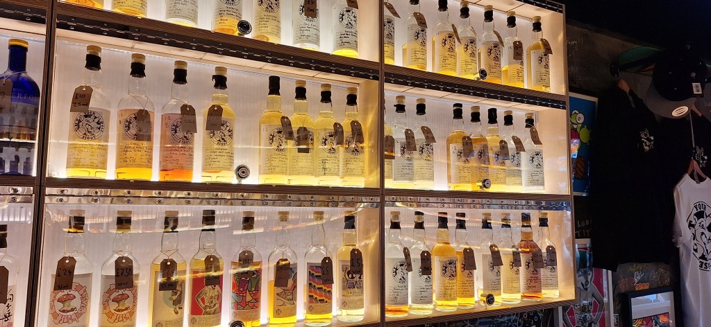 Shelves of Bottles at Cut Your Wolf Loose including cask samples