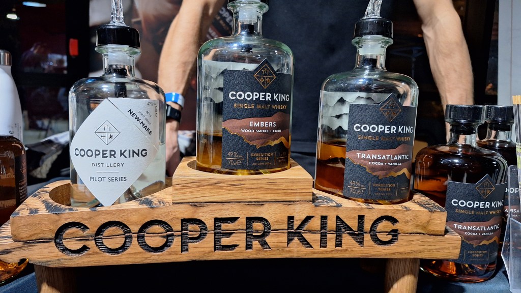 Cooper King bottles on stand including Transatlantic, New Make and Embers