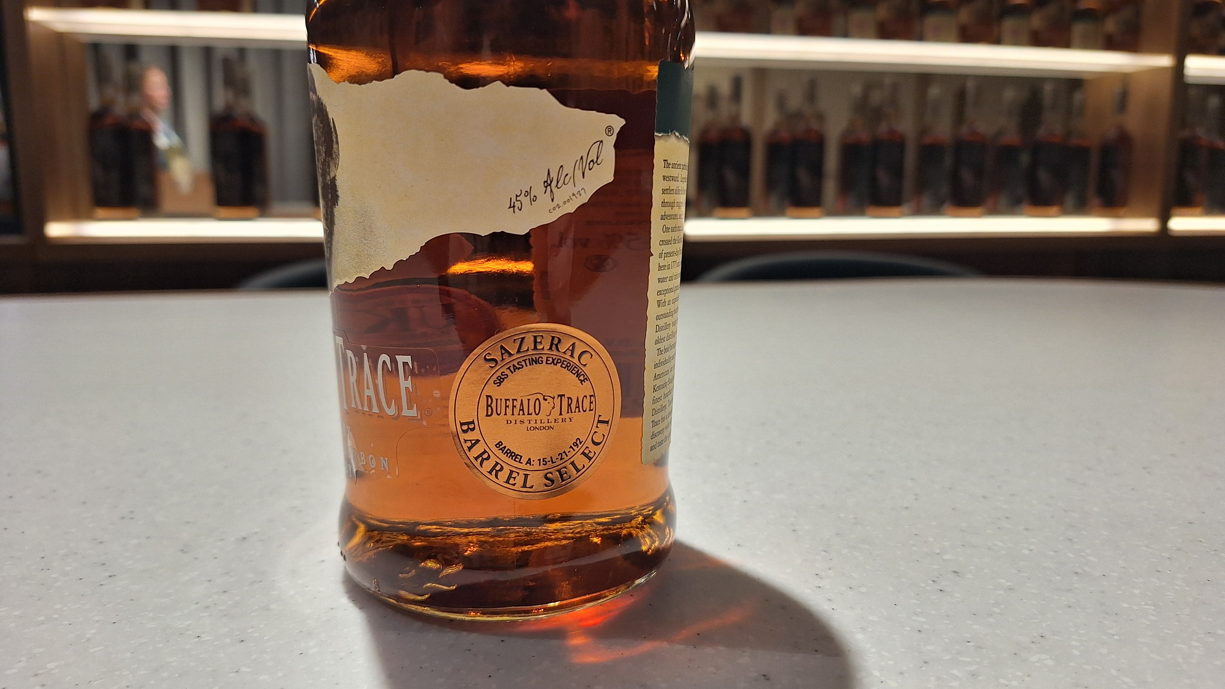 A close up of a buffalo trace bottle showing the barrel number