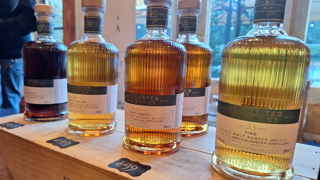 A line up of Uncharted Whisky Bottles at Harrow Whisky Festival